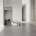 Modern Minimalist Living Room With White Walls Gray Flooring White Sofa And Black Table