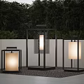Modern Outdoor Lights With Black Frame And Light Colored Shade In Garden Setting With Greenery