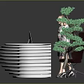 White Curved Reception Desk With Computer On Top And Green Tree Decor Beside Two People