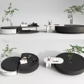 Modern Circular Coffee Table With Black Marble Split Design And Green Plant Decor 3d model
