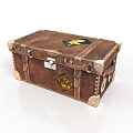 Vintage Brown Leather Trunk With Metal Clasps Gold Emblems And Decorative Straps
