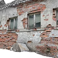 Old Industrial Factory Buildings Featuring Gray Roofs Red Brick Walls Red Doors And Peeling Paint