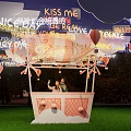 Romantic Hot Air Balloon Shaped Photo Spot With Love Kiss Me Neon Signs At Night