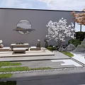 Rockery Stones In Modern Courtyard Garden With White Flower Tree And Stone Path