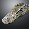 Irregular Shaped Rock With Green Moss And White Stripe On Dark Background