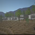 Modern Mountain Guesthouse Buildings on Hillside Surrounded by Trees and Evening Lights