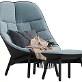 Comfortable Modern Pink Accent Chair With Quilted Backrest Blue Pillow And Fringe Blanket