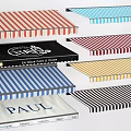 Colorful Striped Awnings With Various Designs For Outdoor Spaces And Brand Logos