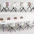 Long White Conference Table With White And Brown Chairs In Modern Office Setup