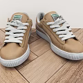 Tan Low Top Casual Sneakers With White Stripes And Rubber Sole Design