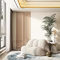 Cozy Beige Bean Bag Chair in Modern Living Room with Decorative Plant Vase and Side Table