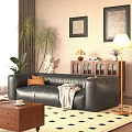 Black Leather Three Seater Sofa With Orange Cushion Gray Blanket And Coffee Table