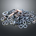 Old Discarded Tires Piled Together In A Large Heap On Dark Background