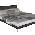 Modern Double Bed With Dark Leather Headboard Gray Pillows And Striped Blanket