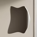 Modern Unique Shaped Mirror With Textured Edges Against Light Colored Wall And Blinds