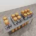 Bamboo Steamers on Stainless Steel Heating Equipment in Modern Kitchen Setting
