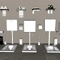 White Bathroom Fixtures Featuring Toilets Sinks And Wall Mounted Shelves With Towels