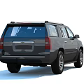 Gray Chevrolet Full Size SUV With Modern Front Grille Design And Sleek Headlights