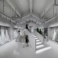 Elegant Bridal Wedding Dress Boutique Interior With Hanging White Gowns And Staircase