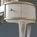 Elegant White Dining Table With Round Top Curved Legs And Gold Accents