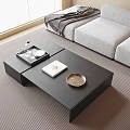 Modern Black Coffee Table With Tray Book Glasses And Gray Sofa In Living Room