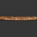 Golden Brown Baked Baguette With Crispy Crust On Black Background