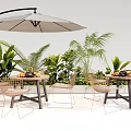 Outdoor Patio Table with Umbrella Wicker Chairs Green Plants and Fresh Fruits