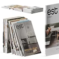 Stacked Magazines With Various Cover Designs And Titles In Neatly Arranged Piles