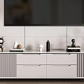 Modern White Ribbed TV Stand With Drawers Decorative Items And Potted Plant