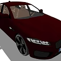 Dark Brown Jaguar Car With Sleek Body Distinctive Grille Sharp Headlights And Black Alloy Wheels