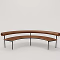 Modern Curved Leisure Chair With Brown Leather Seat Cylindrical Armrests And Black Metal Legs