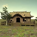 Traditional Thatched House With Straw Roof Wooden Veranda And Grassland Tree Surroundings