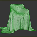 White Textured Cloth Covered Chair With Draped Fabric On Dark Surface
