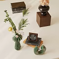 Decorative Items with Green Vase Flowers Leaves Photo Frame Books and Wooden Base Decor