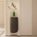Modern Foyer Hallway Design With Light Colored Walls Stone Pillar Green Vase And Small Plant
