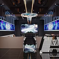Modern KTV Interior Design With Large Screen Neon Lights Reflective Floor And Sofa