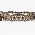 Intricate Carved Metal Artwork With Symmetric Birds And Floral Center Design