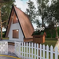 Wooden A Frame Cabin With White Exterior Surrounded by Trees and White Picket Fence