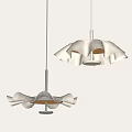 Modern Petal Shaped White Chandeliers Hanging In Minimalist Interior With Warm Lighting