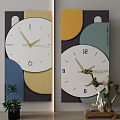 Modern Decorative Wall Clock Featuring Geometric Design Colorful Background And Plant Accents