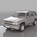 Silver Chevrolet SUV With Roof Rack And Sturdy Exterior Design Front View