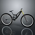 Black Mountain Bike with Large Wheels Yellow Fork and Black Frame on Gray Reflective Surface
