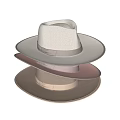 Three Stacked Hats With Different Light Tones And Satin Ribbons
