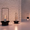 Decorative Ornament Combination Of Black Metal Candle Holders With Lit White Candles In Various Sizes