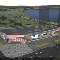 Modern Commercial Complex Featuring Lakefront Greenery Busy Pedestrians Parking Lots and Billboards
