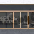 Gold Frame Glass Panels Entrance Door With Marble Wall And Reflections Of Buildings Trees Vehicles