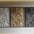 Modern Embossed Wall Decor with Three Colored Panels and Black Frames 3d model