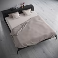 Modern Double Bed with Black Headboard White Pillows Beige Bedding in Wooden Floor Interior