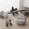 Modern Stylish Gray Accent Chairs With Unique Curved Designs In Interior Living Room