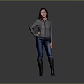 A Stylish Woman In Gray Jacket Blue Jeans And Black Boots With Hand On Hip